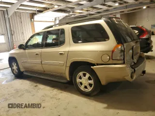 2004 GMC Envoy SLT with VIN 1GKET16S546158305, listed as a Copart auction lot 72409094 with 171,302 mi miles and Salvage Title. Bid and sale history available at DreamBid. Image 2.