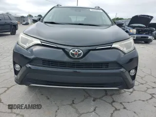 2018 Toyota RAV4 XLE with VIN 2T3WFREV4JW429334, listed as a Copart auction lot 56934855 with 117,761 mi miles and Salvage title. Bid and sale history available at DreamBid. Image 5.