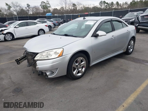 2009 Pontiac G6 1SB z VIN 1G2ZJ57B994252266, wystawiony jako IAAI lot #41609938 z przebiegiem 162 412 mil mil oraz . Historia ofert i sprzedaży dostępna na DreamBid. Obrazek 2.