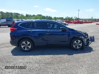 2019 Honda CR-V LX with VIN 2HKRW5H39KH400453, listed as a IAAI auction lot 40041024 with 76,932 mi miles and . Bid and sale history available at carsss.com. Image 14.