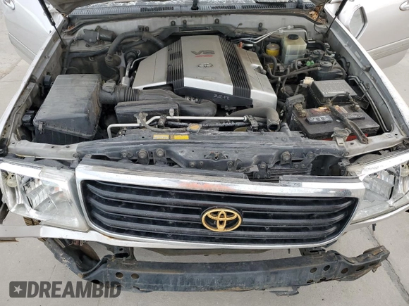 2000 Toyota Land Cruiser z VIN JT3HT05J4Y0088451, wystawiony jako Copart lot #52208905 z przebiegiem 329 751 mil mil oraz Nie do naprawy • Non repairable. Historia ofert i sprzedaży dostępna na DreamBid. Obrazek 12.