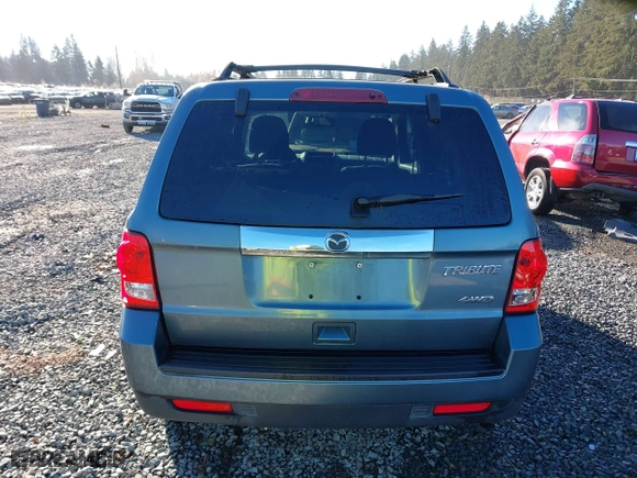 2010 Mazda Tribute Touring with VIN 4F2CY9C73AKM04595, listed as a IAAI auction lot 40797681 with 122,774 mi miles. Bid and sale history available at carsss.com. Image 16.