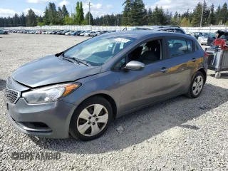 2016 Kia Forte LX z VIN KNAFK5A81G5648950, wystawiony jako Copart lot #55185105 z przebiegiem 138 000 mil mil oraz Czysty tytuł • Clean title. Historia ofert i sprzedaży dostępna na DreamBid. Obrazek 1.