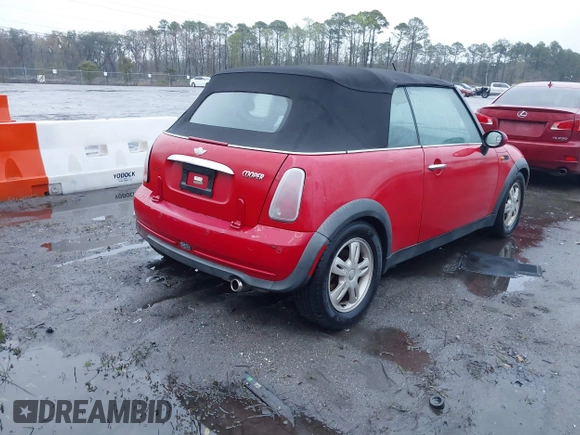 2006 MINI Convertible with VIN WMWRF33526TF64836, listed as a IAAI auction lot 41766880 with 207,094 mi miles and . Bid and sale history available at DreamBid. Image 4.