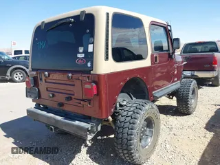 2001 Jeep Wrangler Sahara with VIN 1J4FA59S71P326941, listed as a IAAI auction lot 41648420 with 128,464 mi miles. Bid and sale history available at carsss.com. Image 4.