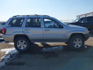 2004 Jeep Grand Cherokee Limited z VIN 1J4GW58S84C269863, wystawiony jako IAAI lot #41900325 z przebiegiem 226 587 mil mil oraz . Historia ofert i sprzedaży dostępna na DreamBid. Obrazek 14.