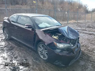 2012 Scion tC with VIN JTKJF5C70C3034489, listed as a IAAI auction lot 41678293 with 166,218 mi miles. Bid and sale history available at carsss.com. Image 1.