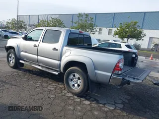 2014 Toyota Tacoma PreRunner with VIN 3TMJU4GN0EM163253, listed as a IAAI auction lot 41559780 with 155,883 mi miles. Bid and sale history available at carsss.com. Image 3.