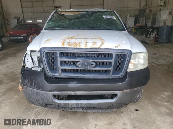 2007 Ford F-150 XL with VIN 1FTRF12237NA02185, listed as a Copart auction lot 52074215 with 204,888 mi miles and Salvage Title. Bid and sale history available at carsss.com. Image 5.