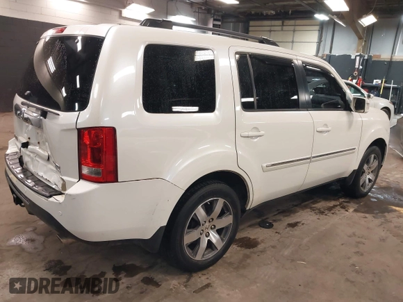 2015 Honda Pilot Touring with VIN 5FNYF4H98FB001841, listed as a IAAI auction lot 41955645 with 109,818 mi miles. Bid and sale history available at carsss.com. Image 4.