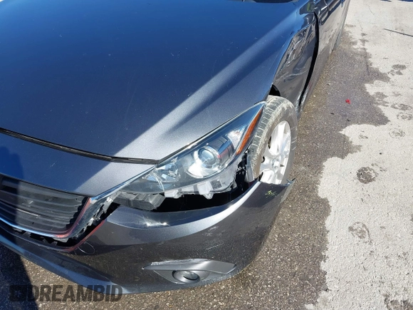 2016 Mazda 3 i Touring with VIN 3MZBM1L74GM299119, listed as a IAAI auction lot 40717069 with 63,083 mi miles and . Bid and sale history available at DreamBid. Image 6.