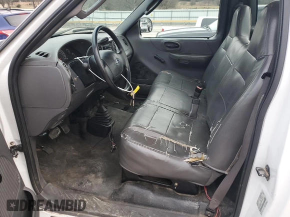 2003 Ford F-150 XL with VIN 1FTRF18W03NA77544, listed as a Copart auction lot 84805894 with Not provided miles and Salvage title. Bid and sale history available at DreamBid. Image 7.