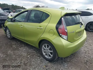 2015 Toyota Prius c One with VIN JTDKDTB36F1096872, listed as a IAAI auction lot 41202434 with 130,386 mi miles. Bid and sale history available at carsss.com. Image 3.