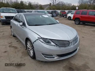 2014 Lincoln MKZ with VIN 3LN6L2J91ER831441, listed as a IAAI auction lot 41694019 with 164,898 mi miles. Bid and sale history available at carsss.com. Image 1.