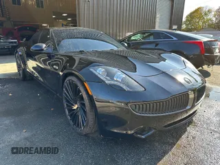2012 Fisker Karma EcoSport z VIN YH4K14AA3CA001930, wystawiony jako IAAI lot #41805327 z przebiegiem 47 417 mil mil oraz . Historia ofert i sprzedaży dostępna na DreamBid. Obrazek 1.