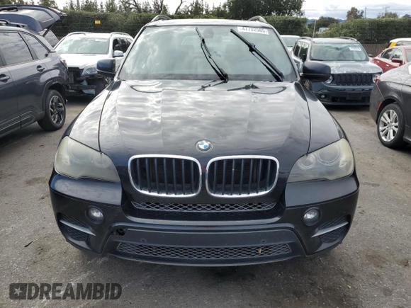 2011 BMW X5 35i z VIN 5UXZV4C59BL741822, wystawiony jako Copart lot #47702585 z przebiegiem 199 314 mil mil oraz Czysty tytuł • Clean title. Historia ofert i sprzedaży dostępna na DreamBid. Obrazek 5.