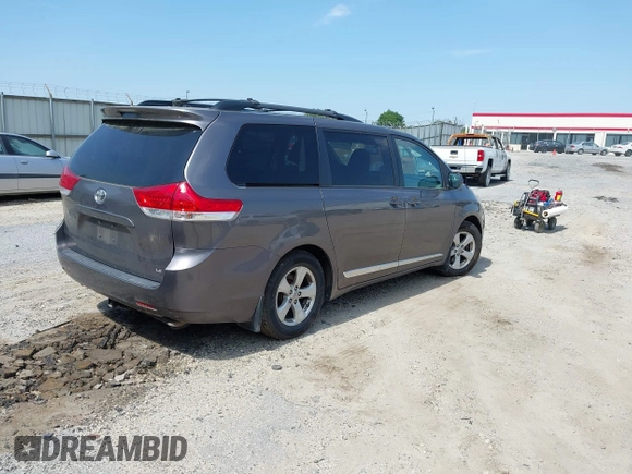 2014 Toyota Sienna LE AAS with VIN 5TDKK3DC4ES431664, listed as a IAAI auction lot 42081429 with 208,505 mi miles and . Bid and sale history available at carsss.com. Image 4.