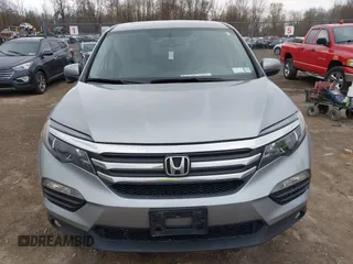 2017 Honda Pilot EX-L with VIN 5FNYF6H5XHB014067, listed as a IAAI auction lot 42083742 with 143,043 mi miles and . Bid and sale history available at DreamBid. Image 12.