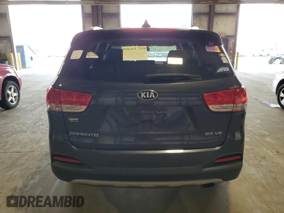 2016 Kia Sorento EX with VIN 5XYPHDA50GG017183, listed as a Copart auction lot 55647524 with 100,859 mi miles and Clean Title. Bid and sale history available at carsss.com. Image 6.
