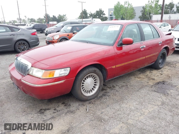 2000 Mercury Grand Marquis LS z VIN 2MEFM75W0YX658319, wystawiony jako IAAI lot #42028736 z przebiegiem 154 651 mil mil oraz . Historia ofert i sprzedaży dostępna na DreamBid. Obrazek 2.