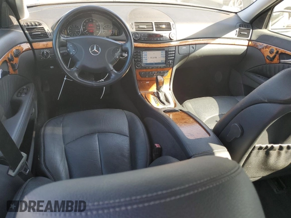 2006 Mercedes-Benz E 500 with VIN WDBUH83J96X194071, listed as a Copart auction lot 71035284 with 121,818 mi miles and Salvage Title. Bid and sale history available at carsss.com. Image 8.