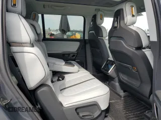 2023 Rivian R1S Adventure z VIN 7PDSGABA5PN010593, wystawiony jako Copart lot #52508835 z przebiegiem 16 962 mil mil oraz Szkody całkowita. Historia ofert i sprzedaży dostępna na DreamBid. Obrazek 11.