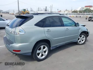 2004 Lexus RX 330 with VIN 2T2HA31U04C038483, listed as a IAAI auction lot 42025073 with 128,047 mi miles. Bid and sale history available at carsss.com. Image 4.