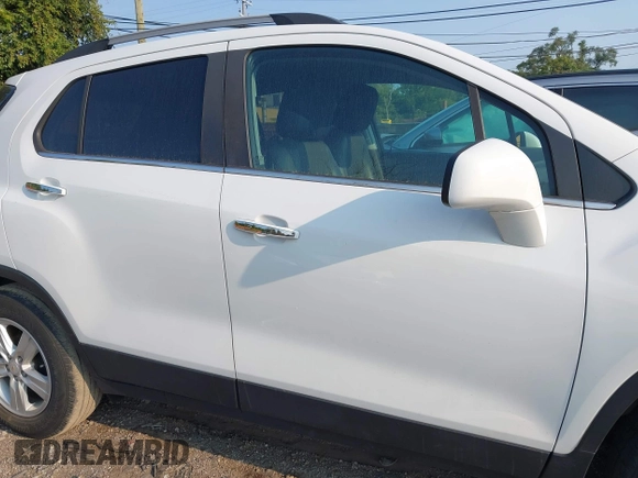 2020 Chevrolet Trax LT with VIN KL7CJLSBXLB073148, listed as a IAAI auction lot 40321540 with 53,972 mi miles and . Bid and sale history available at DreamBid. Image 14.