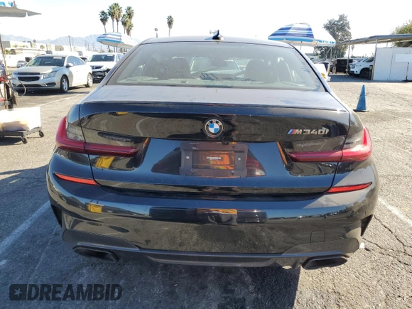 2022 BMW 3 Series M340i with VIN 3MW5U7J04N8C55794, listed as a Copart auction lot 80082294 with 0 mi miles and Salvage Title. Bid and sale history available at carsss.com. Image 6.