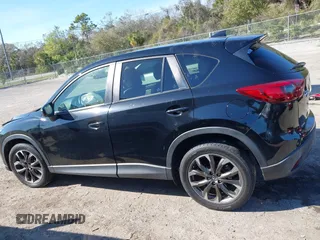 2016 Mazda CX-5 Grand Touring with VIN JM3KE4DY4G0677605, listed as a IAAI auction lot 41642893 with Not Provided miles and . Bid and sale history available at carsss.com. Image 14.