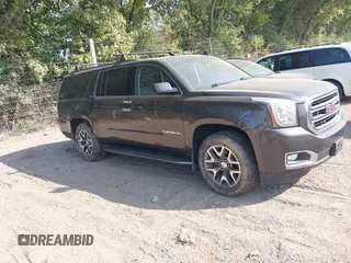 2015 GMC Yukon XL SLT z VIN 1GKS2HKC3FR606121, wystawiony jako IAAI lot #40327820 z przebiegiem 189 351 mil mil oraz . Historia ofert i sprzedaży dostępna na DreamBid. Obrazek 1.