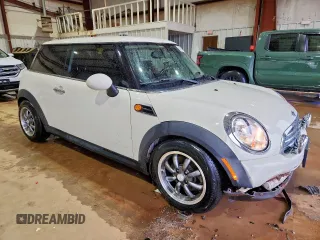 2012 MINI Hardtop z VIN WMWSU3C54CT543437, wystawiony jako Copart lot #60613355 z przebiegiem 43 932 mil mil oraz Szkoda całkowita • Salvage title. Historia ofert i sprzedaży dostępna na DreamBid. Obrazek 4.