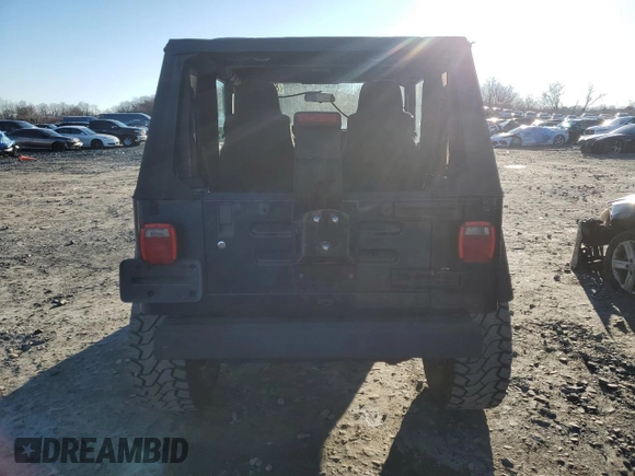2005 Jeep Wrangler SE with VIN 1J4FA29S95P370542, listed as a Copart auction lot 85571924 with 105,465 mi miles and Salvage Title. Bid and sale history available at carsss.com. Image 6.