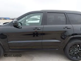 2021 Jeep Grand Cherokee Laredo X with VIN 1C4RJEAG8MC714539, listed as a IAAI auction lot 42190686 with 59,359 mi miles and . Bid and sale history available at DreamBid. Image 14.