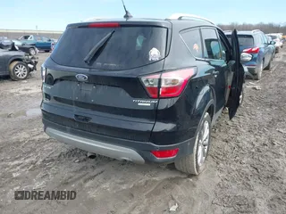 2018 Ford Escape Titanium with VIN 1FMCU0J90JUD17085, listed as a IAAI auction lot 41699687 with Not provided miles and . Bid and sale history available at DreamBid. Image 4.