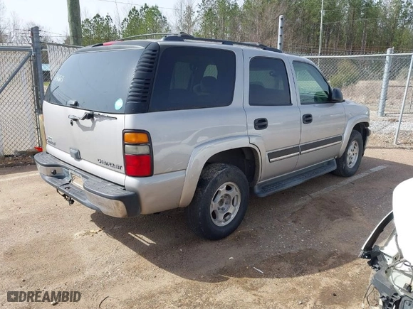 2005 Chevrolet Tahoe LS with VIN 1GNEC13V85R240613, listed as a IAAI auction lot 41676860 with 242,846 mi miles. Bid and sale history available at carsss.com. Image 4.