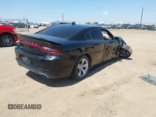 2017 Dodge Charger SXT with VIN 2C3CDXHG0HH571849, listed as a IAAI auction lot 42012518 with 104,586 mi miles and . Bid and sale history available at carsss.com. Image 4.