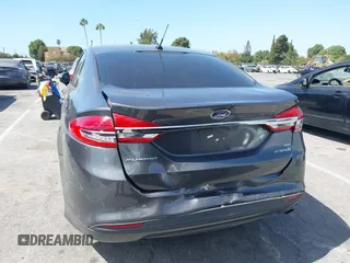 2018 Ford Fusion Hybrid SE with VIN 3FA6P0LU4JR261594, listed as a IAAI auction lot 40360797 with 128,533 mi miles. Bid and sale history available at carsss.com. Image 16.