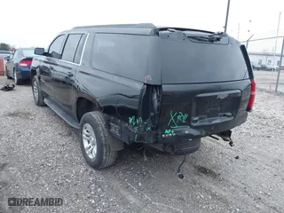 2016 Chevrolet Suburban LT with VIN 1GNSKHKCXGR478707, listed as a IAAI auction lot 41183747 with 157,893 mi miles. Bid and sale history available at carsss.com. Image 3.