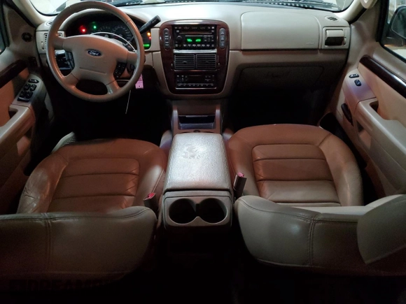 2005 Ford Explorer with VIN 1FMDU75K05ZA54907, listed as a Copart auction lot 80825574 with 154,681 mi miles and Salvage title. Bid and sale history available at DreamBid. Image 8.