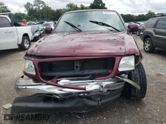 2003 Ford F-150 XL with VIN 1FTRX07L73KC07352, listed as a Copart auction lot 64639214 with 108,003 mi miles and Salvage title. Bid and sale history available at DreamBid. Image 5.