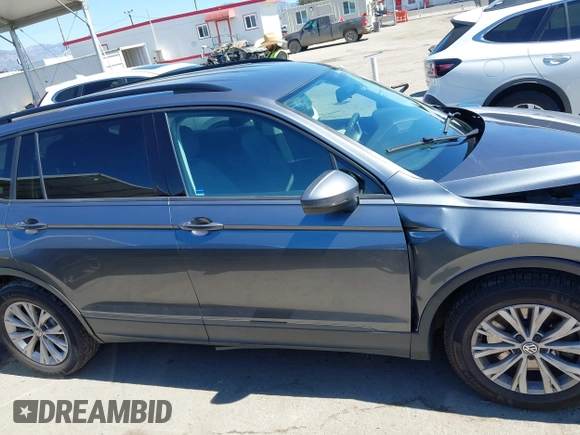 2019 Volkswagen Tiguan S z VIN 3VV1B7AX0KM043032, wystawiony jako IAAI lot #41862179 z przebiegiem 154 440 mil mil oraz . Historia ofert i sprzedaży dostępna na DreamBid. Obrazek 13.