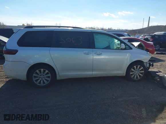 2015 Toyota Sienna Limited z VIN 5TDDK3DC4FS101226, wystawiony jako IAAI lot #40755063 z przebiegiem 153 793 mil mil oraz . Historia ofert i sprzedaży dostępna na DreamBid. Obrazek 13.