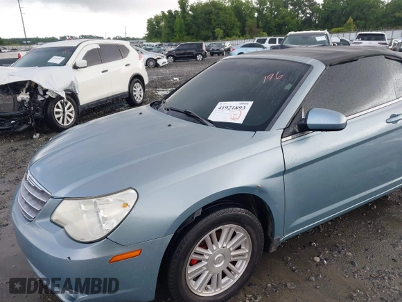 2009 Chrysler Sebring Touring with VIN 1C3LC55D89N501445, listed as a IAAI auction lot 41921893 with 166,149 mi miles and . Bid and sale history available at DreamBid. Image 6.