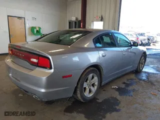 2014 Dodge Charger SE with VIN 2C3CDXBG1EH168337, listed as a IAAI auction lot 41661529 with 151,924 mi miles. Bid and sale history available at carsss.com. Image 4.