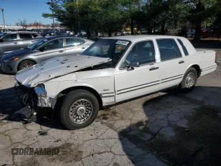 1994 Lincoln Town Car Cartier z VIN 1LNLM83W1RY763140, wystawiony jako Copart lot #84726634 z przebiegiem Nie podano mil oraz Szkoda całkowita • Salvage title. Historia ofert i sprzedaży dostępna na DreamBid. Obrazek 1.
