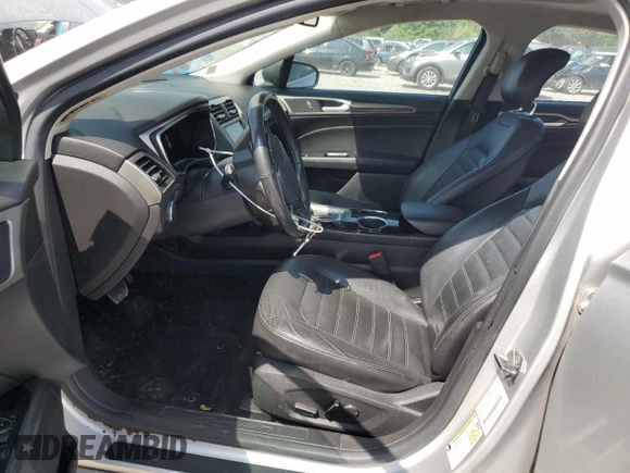 2013 Ford Fusion SE Hybrid z VIN 3FA6P0LU3DR336838, wystawiony jako Copart lot #56205445 z przebiegiem 209 164 mil mil oraz Czysty tytuł • Clean title. Historia ofert i sprzedaży dostępna na DreamBid. Obrazek 7.