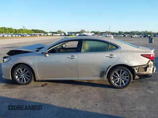 2016 Lexus ES 300h z VIN JTHBW1GG4G2106710, wystawiony jako IAAI lot #41684479 z przebiegiem 144 559 mil mil oraz . Historia ofert i sprzedaży dostępna na DreamBid. Obrazek 15.