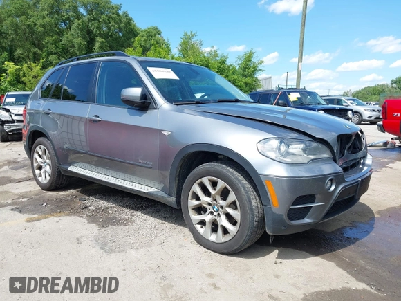 2012 BMW X5 35i z VIN 5UXZV4C50CL989684, wystawiony jako IAAI lot #42284840 z przebiegiem 134 056 mil mil oraz . Historia ofert i sprzedaży dostępna na DreamBid. Obrazek 1.