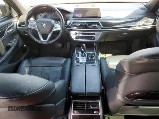 2017 BMW 7 Series 740e xDrive iPerformance with VIN WBA7J2C33HG497980, listed as a Copart auction lot 50244384 with 115,728 mi miles. Bid and sale history available at carsss.com. Image 8.
